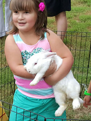 BOY WITH BUNNIES